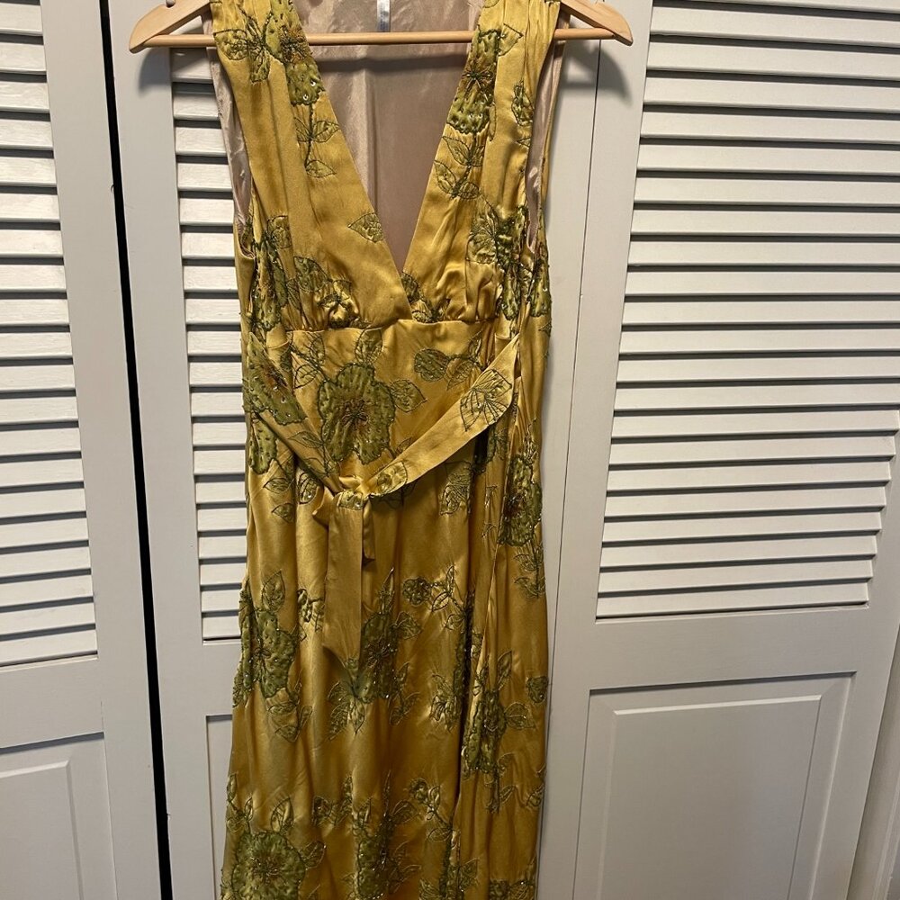 Unique designer dress by Polli Says. Size 8 in a beautiful gold/deep yellow silk